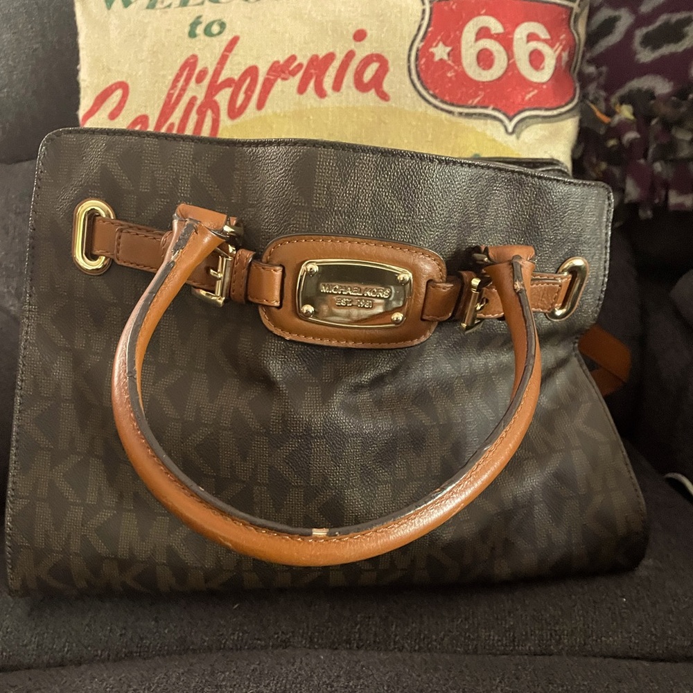 This is a great Michael Kors purse .